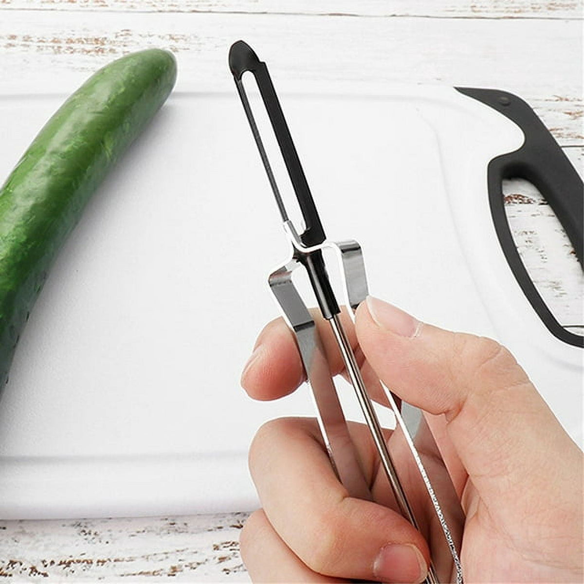 Stainless Steel Swivel Peeler for Vegetables and Fruit, with Blemish Remover for Left or Right Hand - Image 6